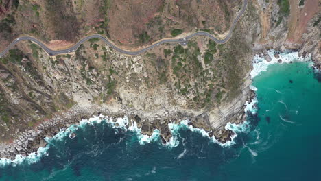 winning road along the ocean in south africa aerial top view