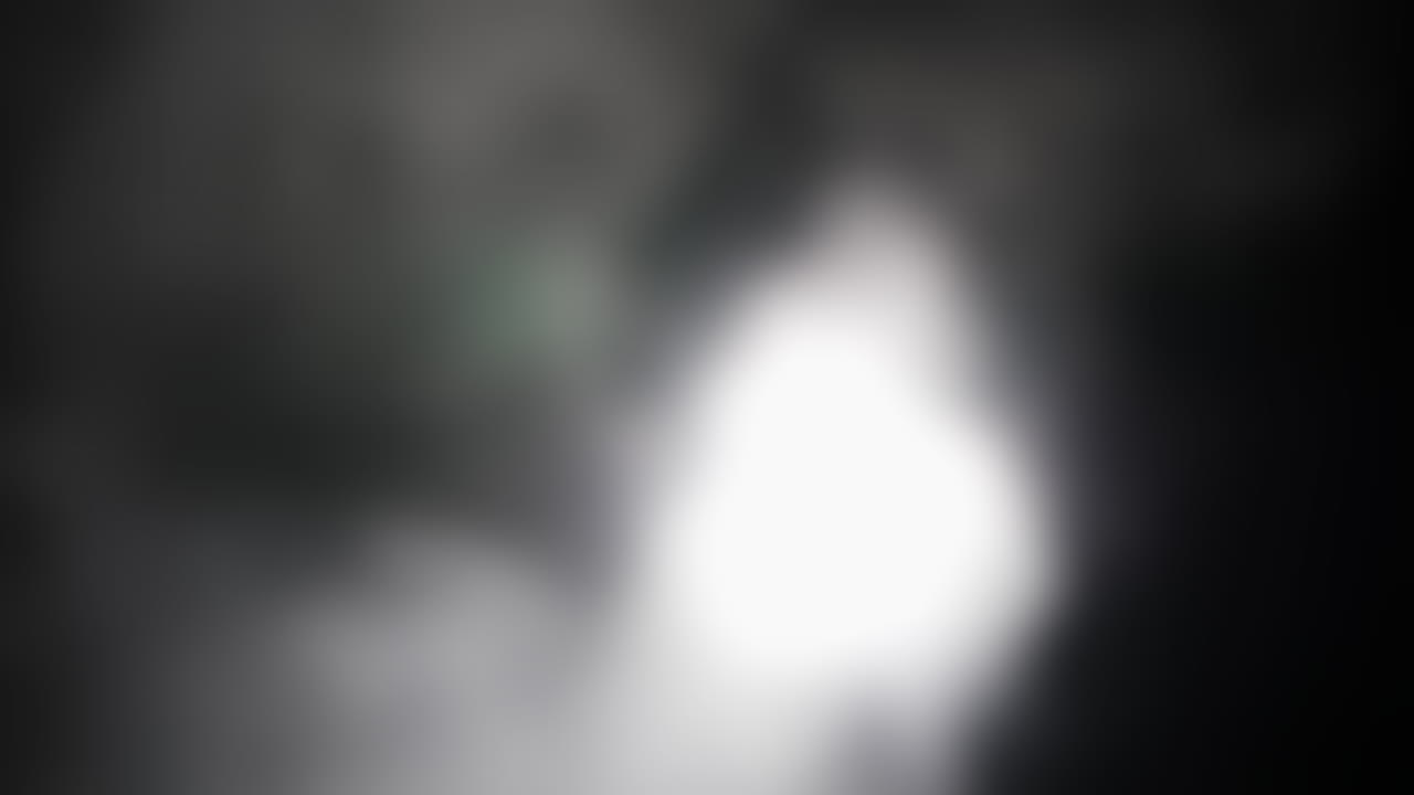 Strange, glowing, alien, UFO orb light, ghost or moon light with smoke and fog for halloween or science fiction, sci-fi background