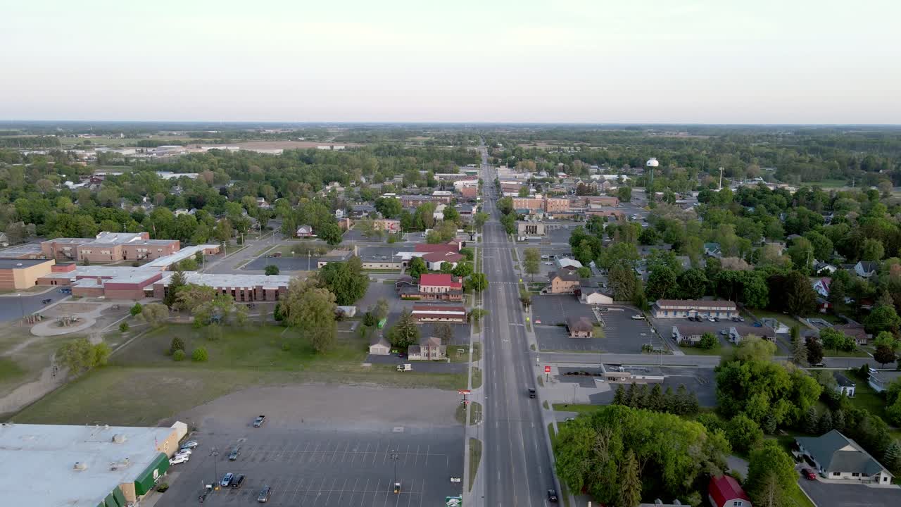 Iconic Clare township in USA, Michigan, aerial ascend view
