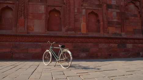 red sandstone wall of a historical building in india
