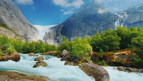 Briksdal-Glacier-With-A-Mountain-River-In-The-Foreground-The-Amazing-Nature-Of-Norway-4k-10-Bit-Vide