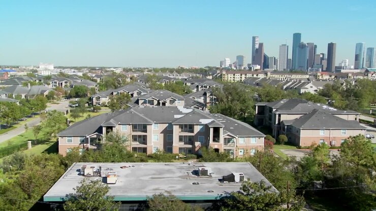 A pan across a suburban area of Houston with the downtown distant