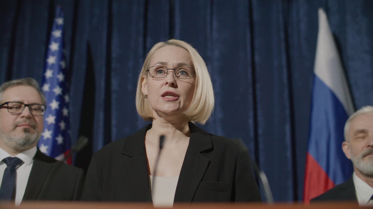 Female Politician Delivering Speech at Diplomatic Press Conference