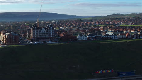 establishing aerial shot of whitby town seafront north yorkshire uk