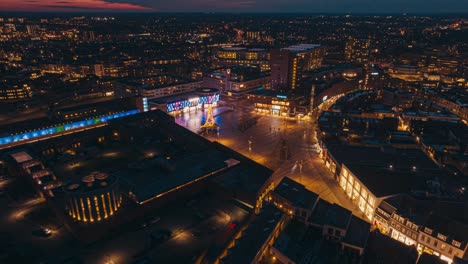 Aerial-hyperlapse-showing-buildings,-cars-and-city-landscape