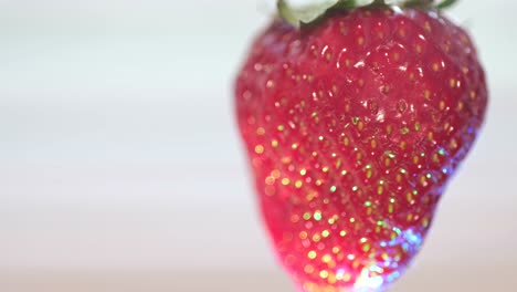 juicy strawberries close-up. vibrant red berry texture slow rotation