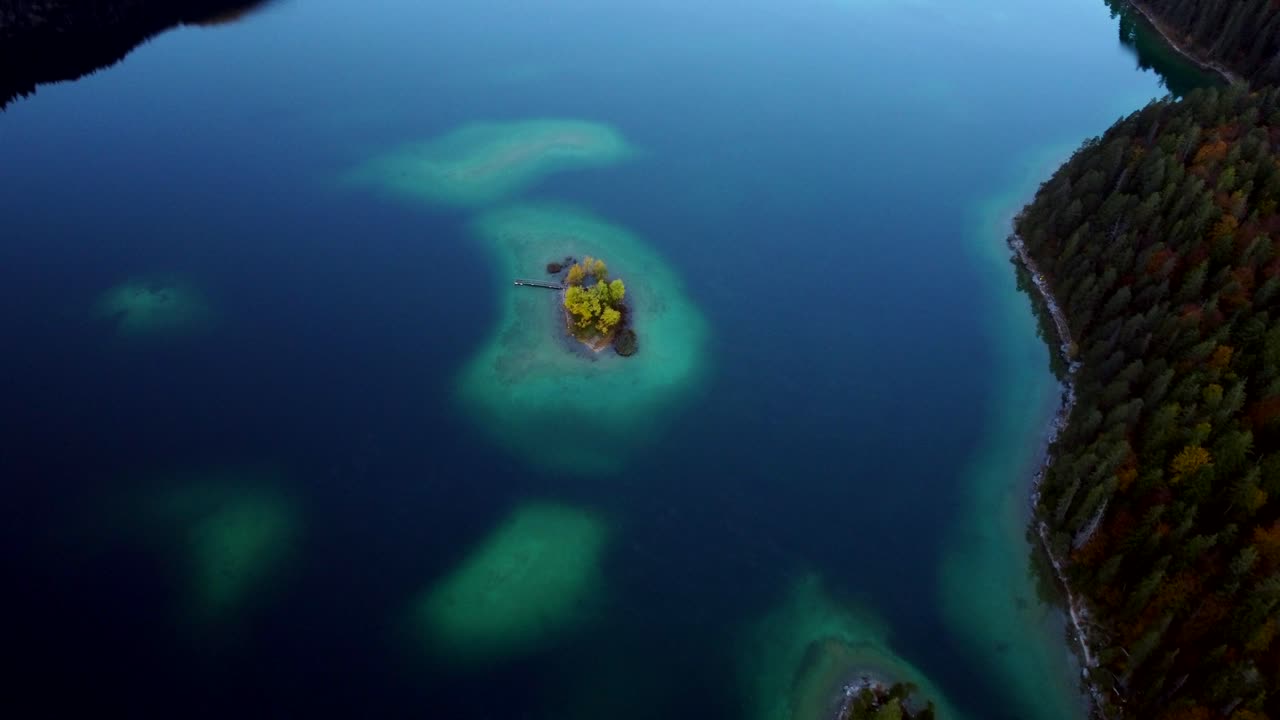 Flying over Eibsee during a peaceful morning in Bavaria, Germany.