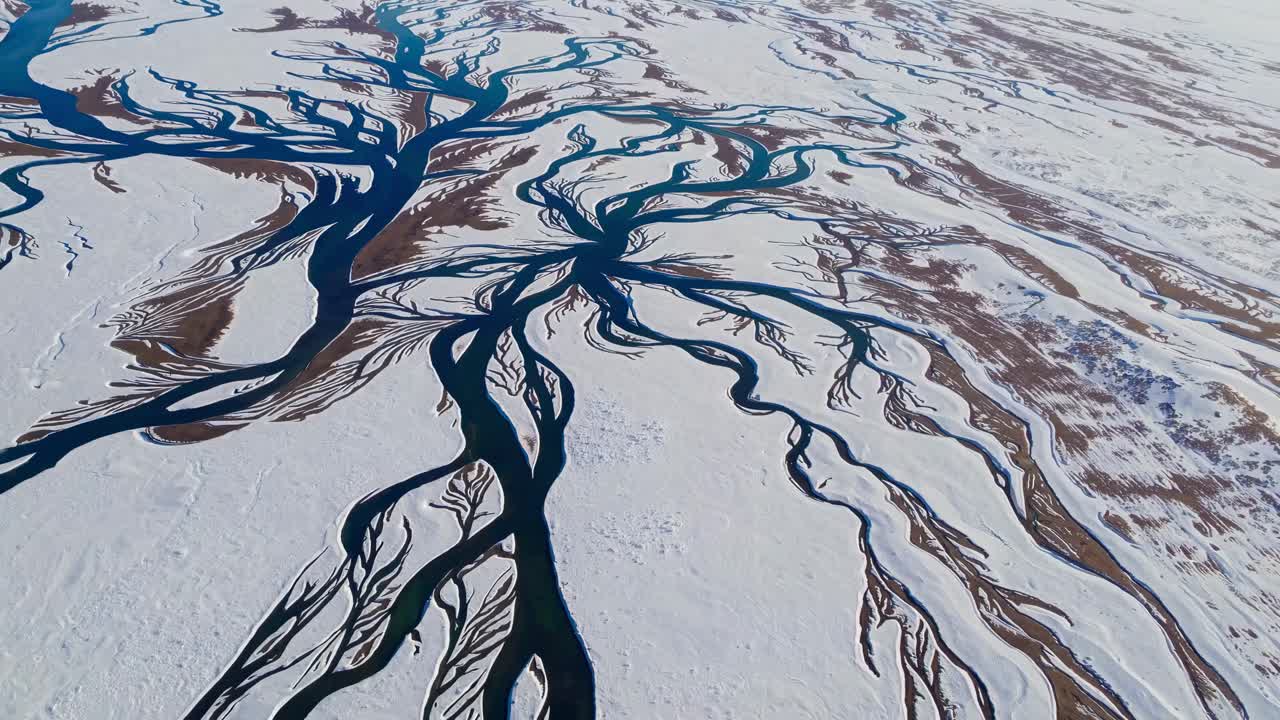 Aerial View of Braided River in Winter Landscape