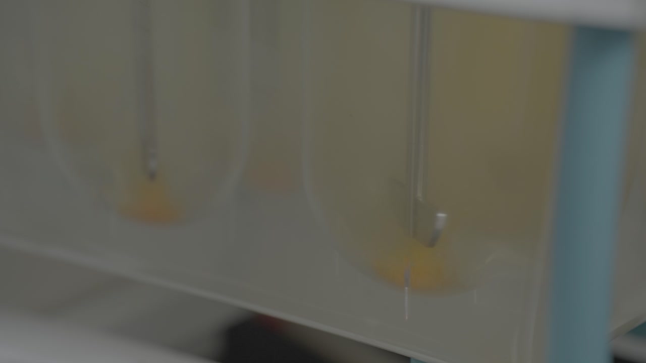 Medical Tables quality check when dissolved in liquid Slog footage.