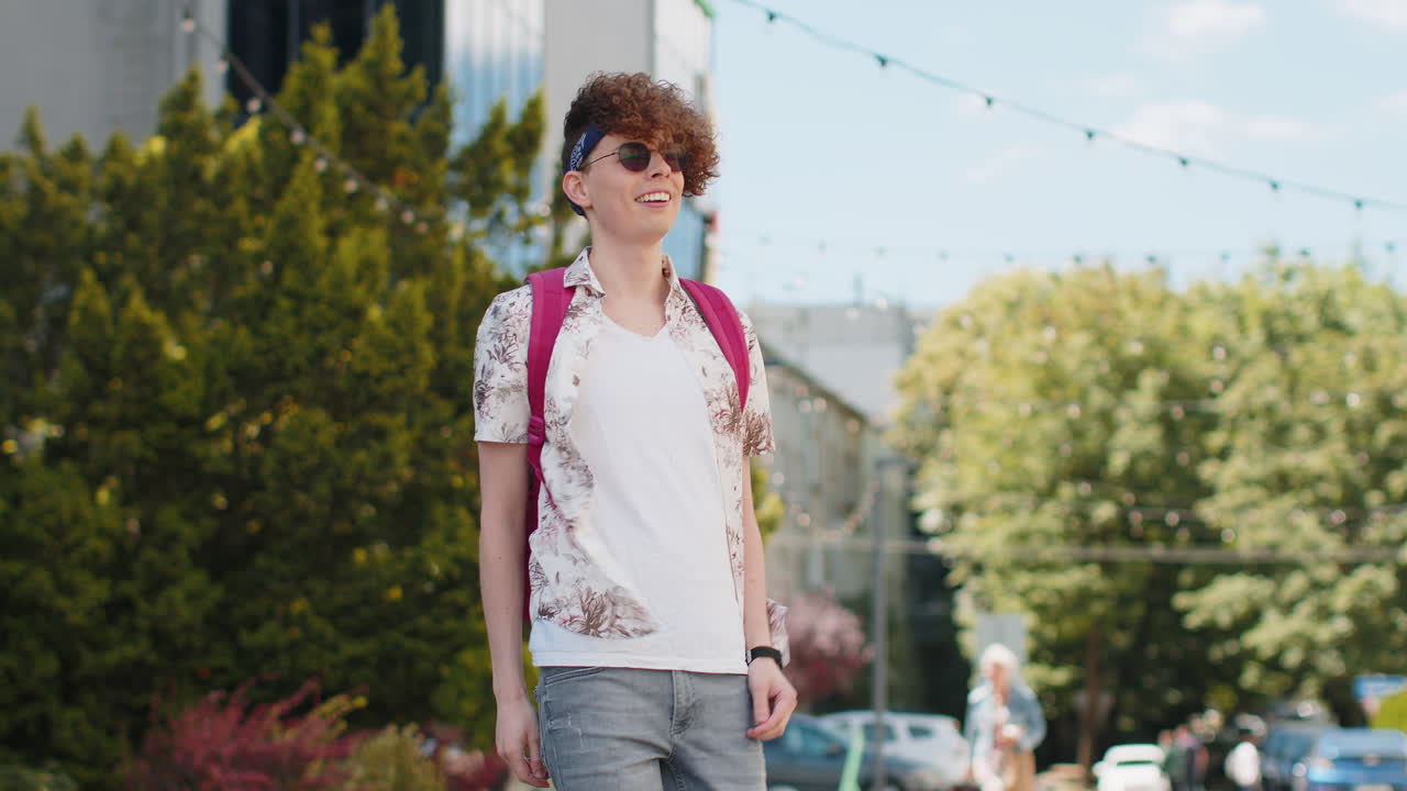 Excited happy man traveler shouting celebrating success winning goal achievement good news