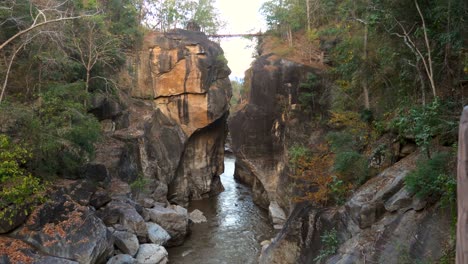 huge rocks canyon with river between in national park of north thailand