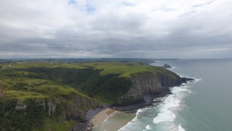 Cinematic-aerial-flying-along-coast-of-East-London-South-Africa