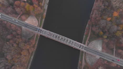 upper view river bridge with traffic autumn forestry banks