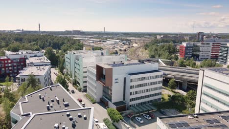 aerial view of helsinki with highway and railroad in the background