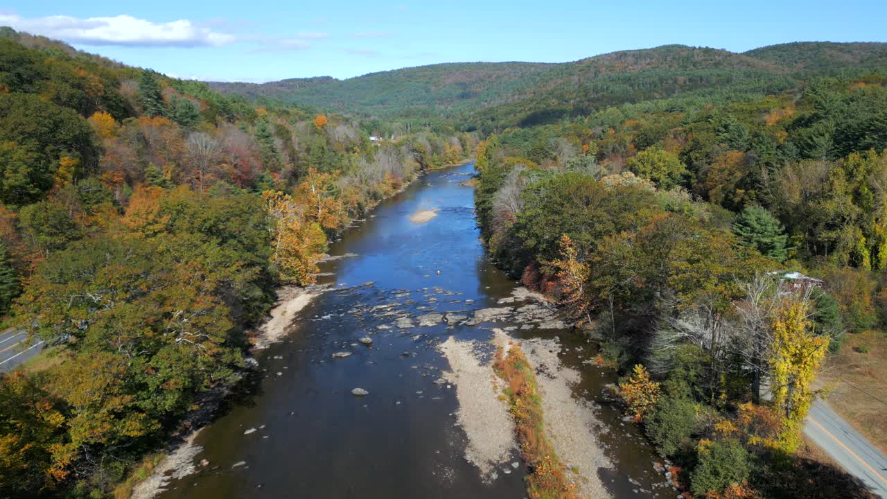 Winding West River, Vermont USA forested riverbanks, drone soothing natural green mountain backdrop
