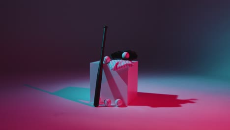 Studio-Baseball-Still-Life-With-Bat-Ball-Catchers-Mitt-And-Team-Jersey-With-Red-And-Blue-Lighting-2