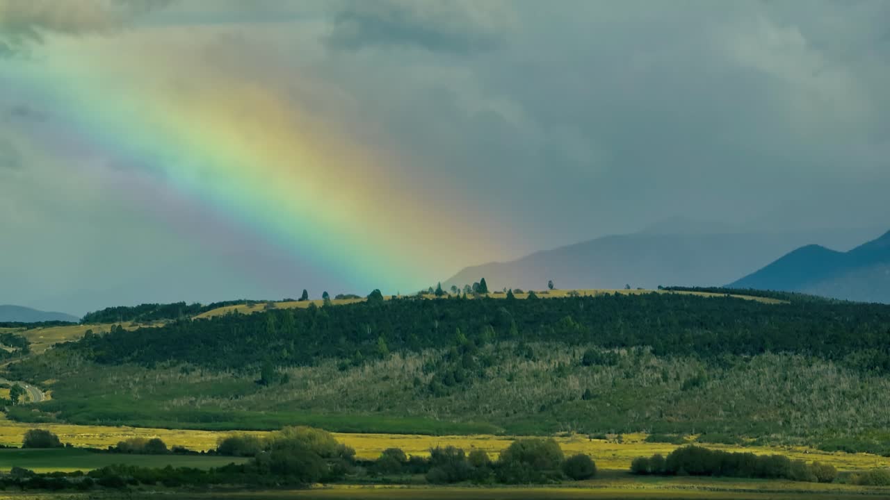 Rainbow over Lake Te Anau, New Zealand, serene landscape, peaceful mood