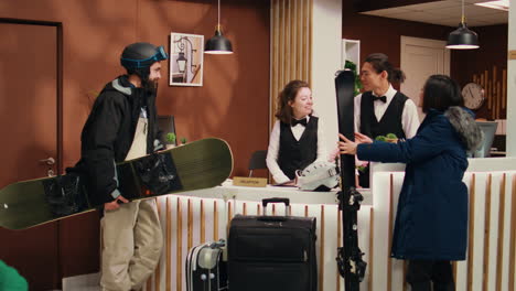 tourists couple arrive at front desk