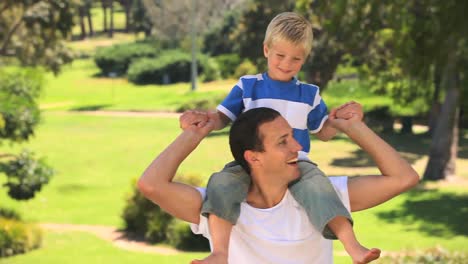 Young-man-playing-with-his-son