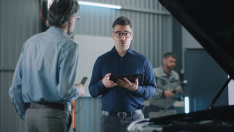 automotive service consultation in a car repair shop