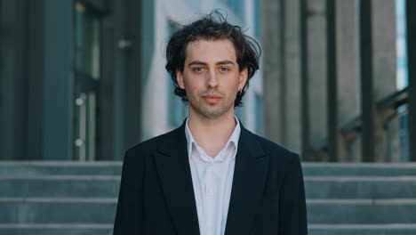 Portrait of a Young Man in a Business Suit Outdoors