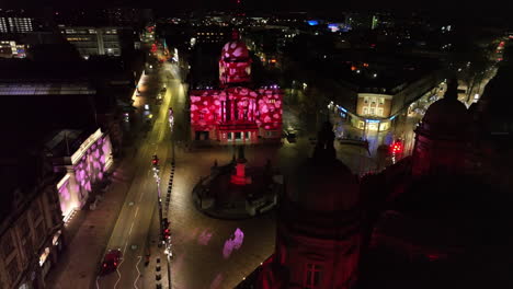 Fly-around-of-Hull's-Queen-Victoria-Square-showing-night-time-projections-for-Valentine's-Day-on-Hull-City-Hall-and-Ferens-Art-Gallery