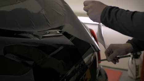 rear window car foil tinting being modeled on window. window tinting