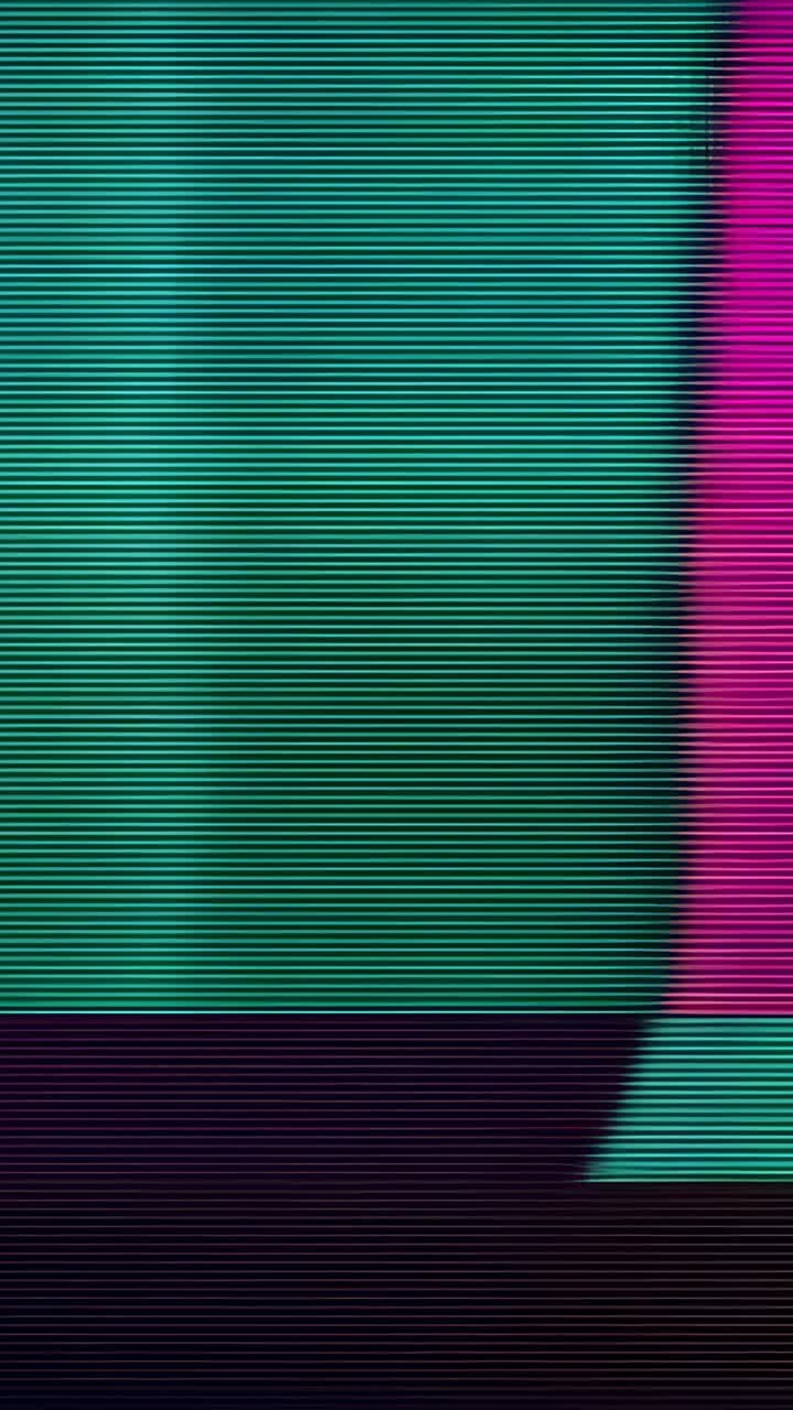 Vertical video: Glitching wide teal band shifting on monitor, simulating glitch with magenta wedge