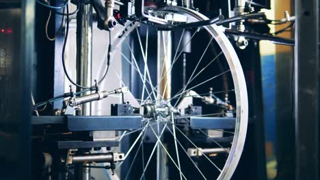 bicycle wheel truing machine at a bicycle factory
