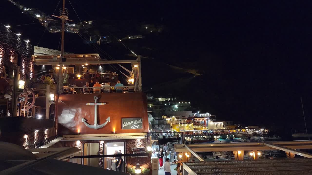 Night view of Ammoudi Bay Restaurant in Santorini, Greece