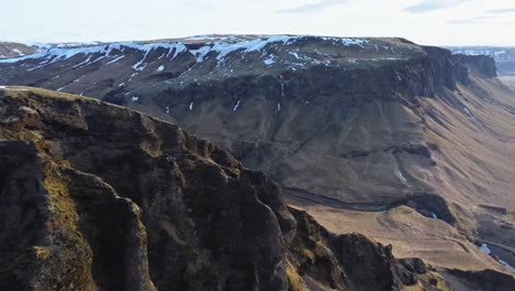 road and mountains on seashore