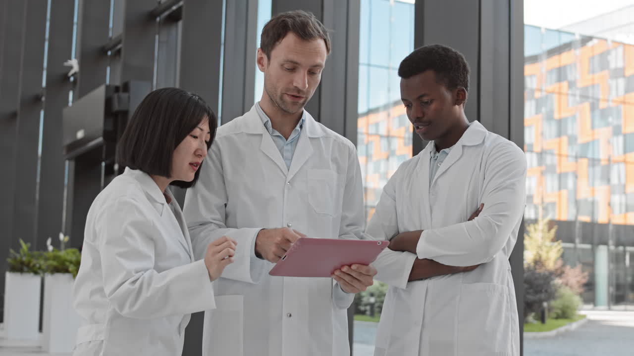 Scientists Using Digital Tablet