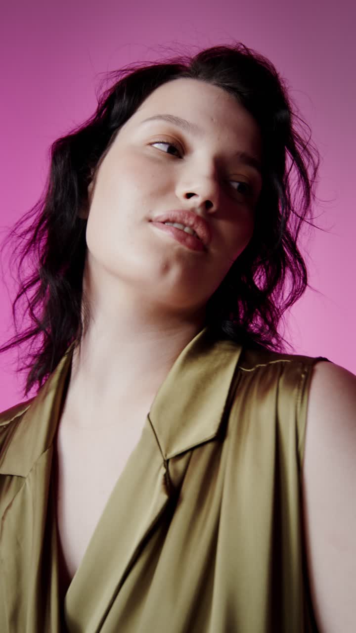 Elegant portrait of a beautiful woman in a silk shirt