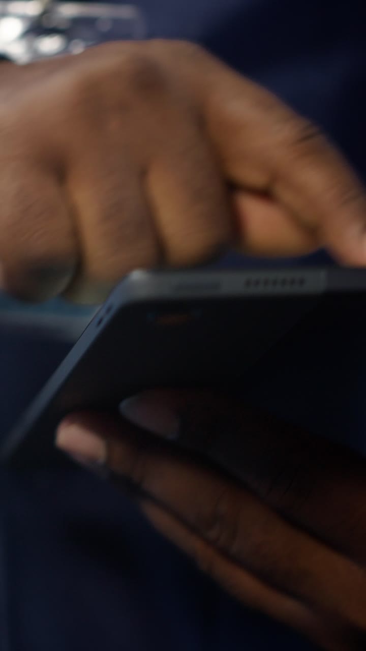 Close-up of Hands Using Digital Tablet Device