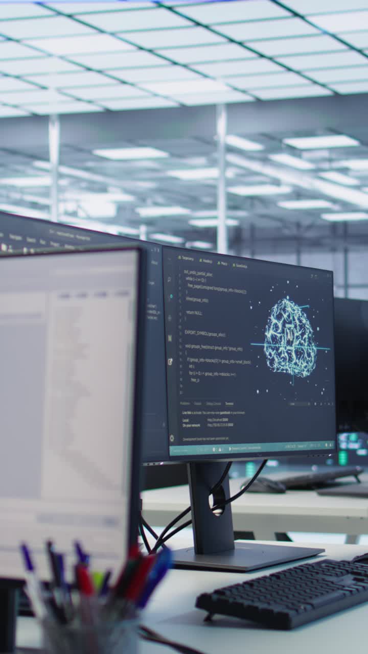 Computer Monitor Displaying Code and AI Brain Graphic in Office