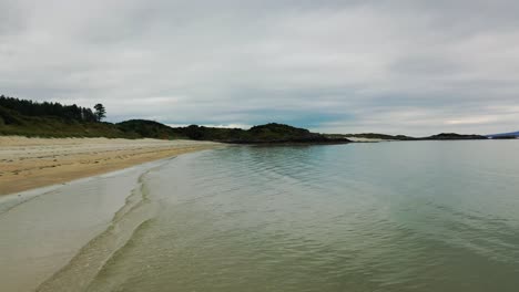 Aerial-view-of-Camusdarach-Beach,-by-Morar-on-the-West-Coast-of-Scotland