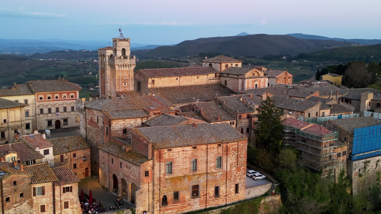 Aerial drone view of the Montepulciano medieval hilltop town in Tuscany, Italy, surrounded by vineyards