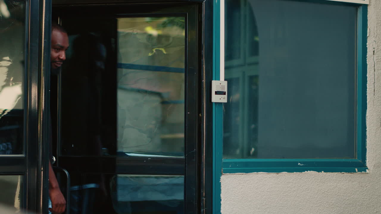 People indoors near a door