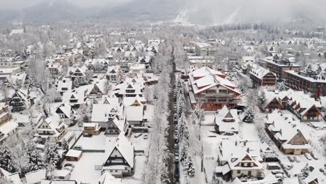 Piłsudskiego-Street-covered-in-Winter-snow-from-above---Drone-Aerial-Zakopane