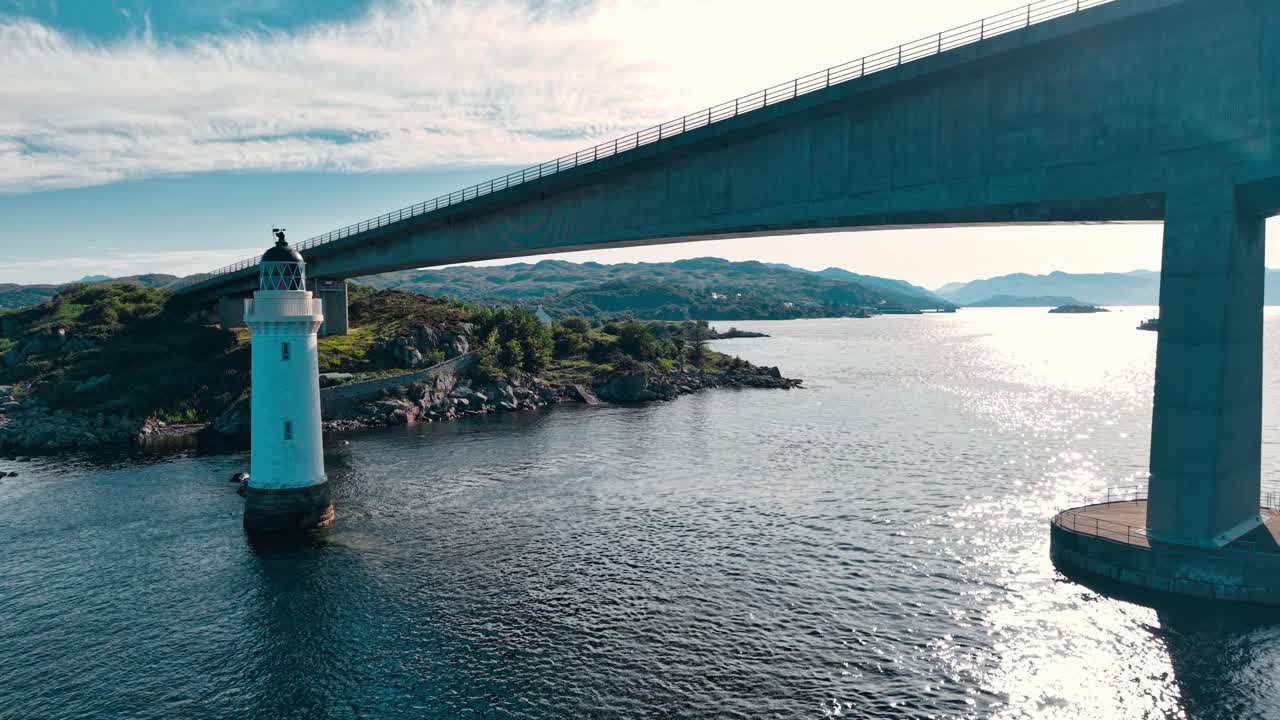 Lighthouse and bridge by the sea