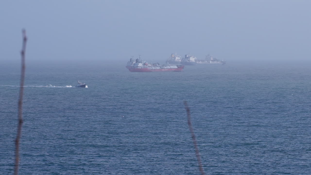Cargo ships at the near the shore