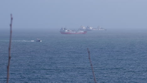cargo ships at the near the shore