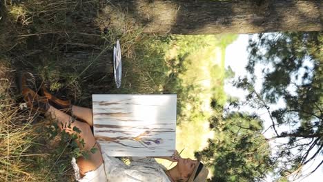 the artist girl is walking in a beautiful park at sunset outdoor recreation the artist girl is walking in a beautiful park at sunset outdoor recreation