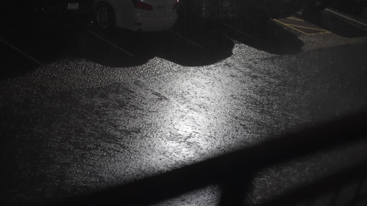 Severe Thunderstorm Rain Flooding Apartment Parking Lot In Denver Colorado. 4K Slow Motion Shot