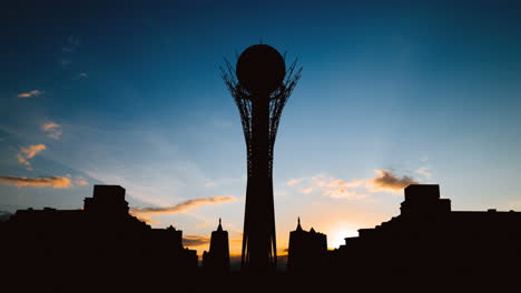 silhouette of bayterek tower at sunset