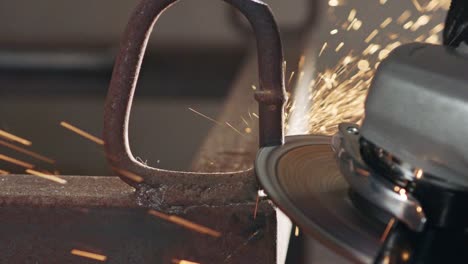 slow motion of a metal grinder during work with sparks flying