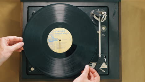 cinematic overhead shot of a vintage turntable