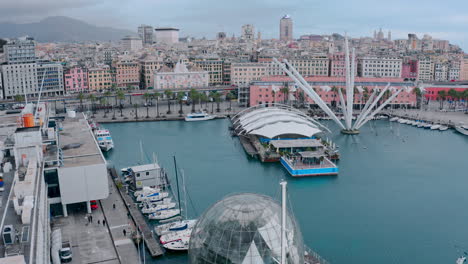 Drone-flight-over-Biosfera-at-Porto-Antico,-Genoa,-Italy