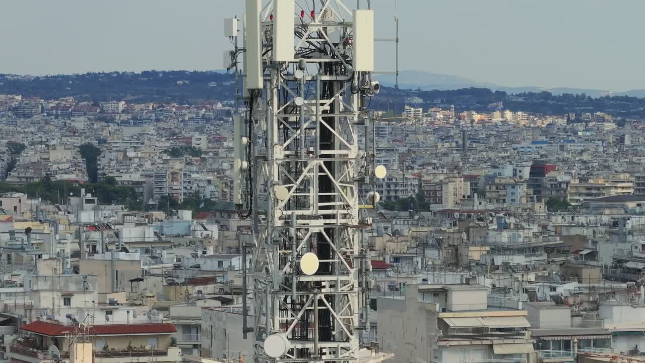 Cell tower with city of Thessaloniki in the background