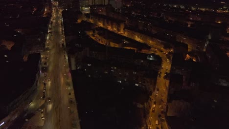 drone footage flying over almada at night, portugal